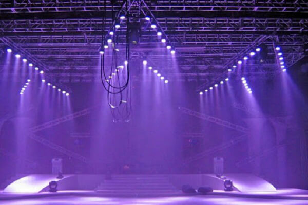 Dynamic concert lighting with moving head beam lights, strobes and laser effects for live music performance Delhi